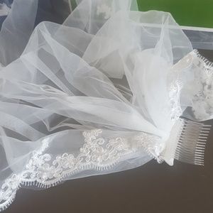 Shoulder length soft white wedding veil